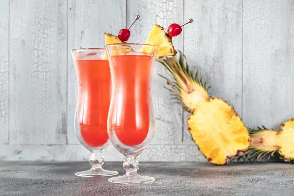 image Mélange Rafraîchissant d'Ananas, Citron, Orange et Grenadine sans Alcool